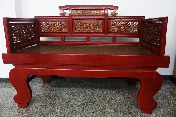 sofá chino antiguo de fumadores de opio